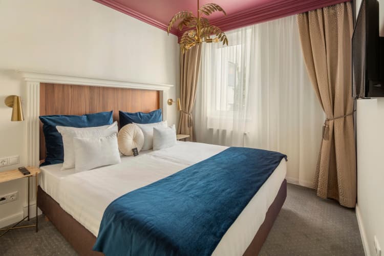 Queen's Court Hotel & Residence - foto 4